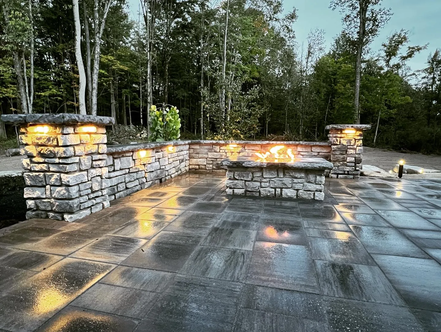 Veloz crew installing a paver patio
